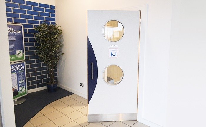 Shaped Fire-rated glass in a firedoor